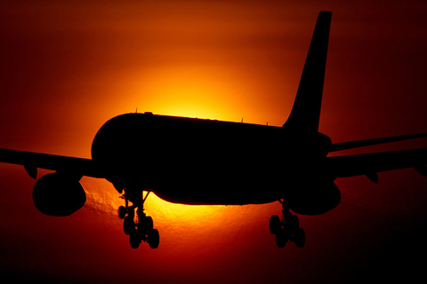 Eclipse Airplane Getty Airplane flying in front of the sun